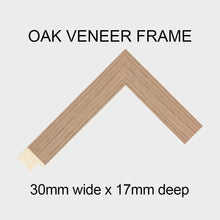 Load image into Gallery viewer, Large Multi Photo Frame - Holds 6 7&quot;x5&quot; and 1 12&quot;x16&quot; Photo in a 30mm Oak Veneer Frame - Multi Photo Frames
